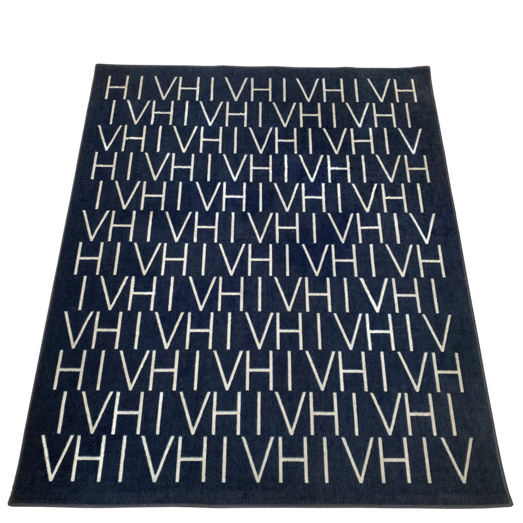 Teppich 'HIV weiß auf schwarz', Pascal Suchier, 1996
